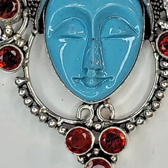Sterling Silver Pendant with Blue Carved Face and Garnet Accents - Picture 8 of 12